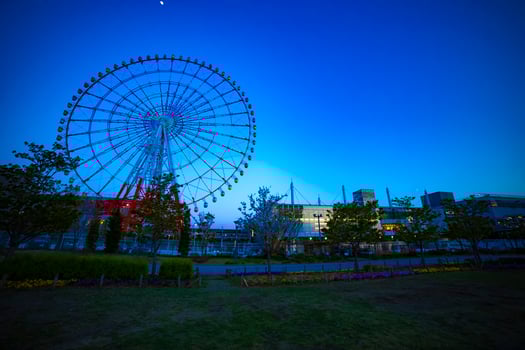 A dusk ferris wheel at the amusement park in Odaiba Tokyo photo