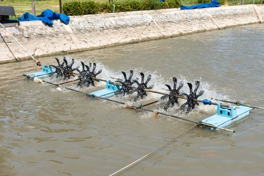 Hydraulic turbines floating with spinning wastewater to clean water photo
