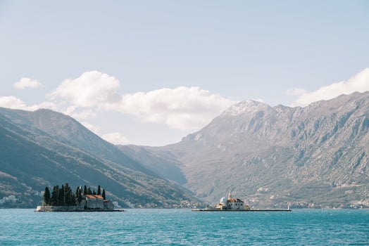 Islands of St. George and Gospa od Skrpjela in the Bay of Kotor with the mountains in the background. Montenegro photo