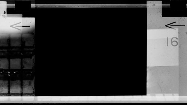 Empty 110mm film frames Or border strip dusty scratched scanned old film texture. photo
