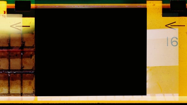 Empty 110mm film frames Or border strip dusty scratched scanned old film texture. photo