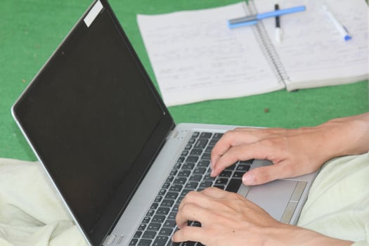 Close up image of Man hands typing on laptop computer keyboard, working, business and technology, internet network communication concept photo