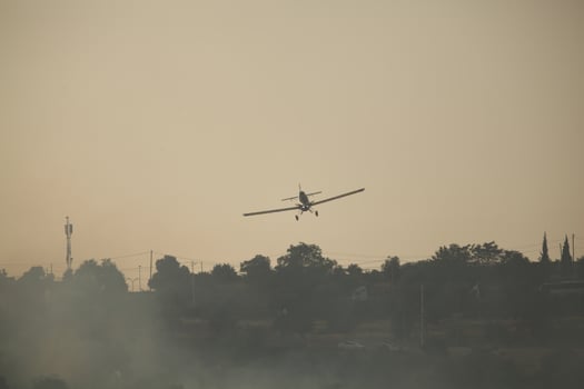 Air Tractor AT-802 Fire fighting Aircraft puts out a forest fire photo