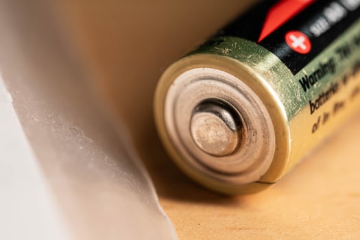 closeup of golden and silver aa alkaline batteries photo
