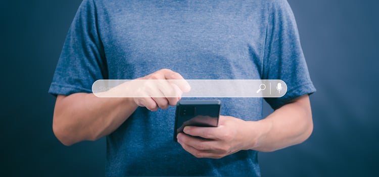 Information search technology, search engine optimization, male hand using a smartphone to search information, using the search bar function on your website photo