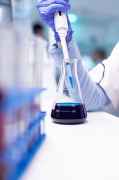 Closeup research of medical scientist working with micropipette. Pharmacy scientist doctor discovery scientific disease with biotechnology professional equipment photo