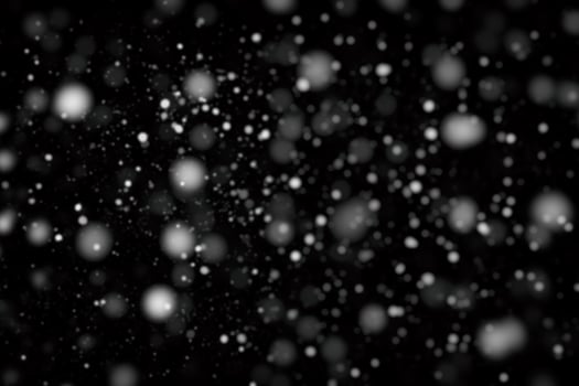 White snow on a black background texture. photo