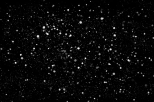 White snow on a black background texture. photo