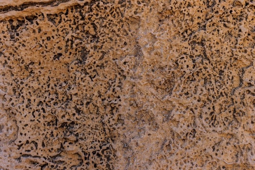 Antique yellow stone texture. photo
