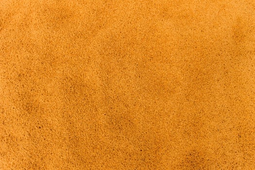 Sandy beach. Detailed sand texture photo