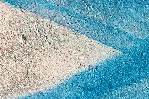 Fragment of colored graffiti painted on a wall. Abstract background for design. photo