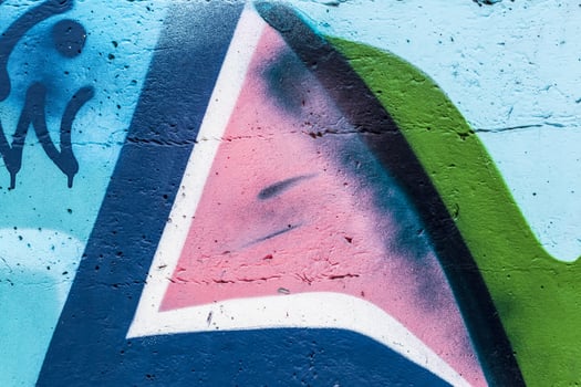 Graffiti painted on a concrete wall texture. photo