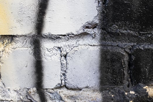 Graffiti painted on a brick wall texture. photo