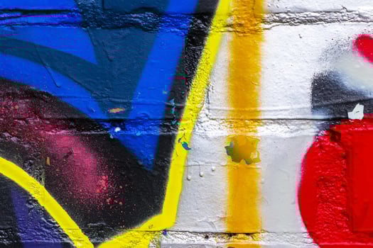 Graffiti painted on a brick wall texture. photo