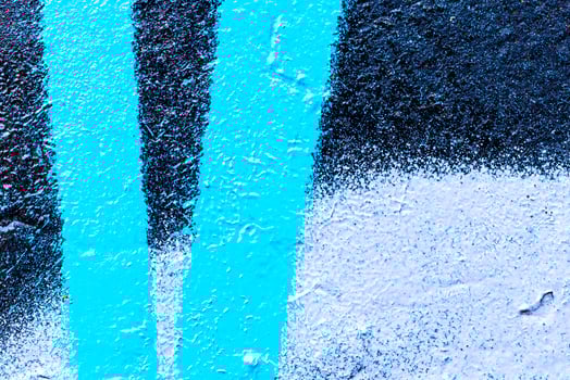 Fragment of colored graffiti painted on a wall. Bright abstract background. photo