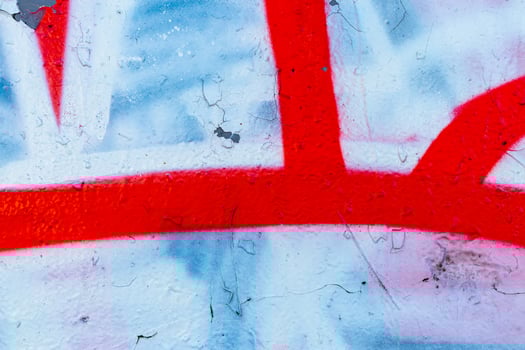 Fragment of colored graffiti painted on a wall. Bright abstract background. photo