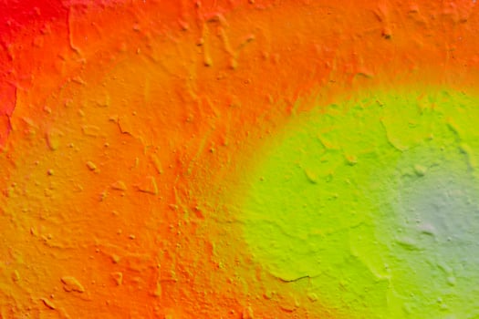 Fragment of colored graffiti painted on a wall. photo