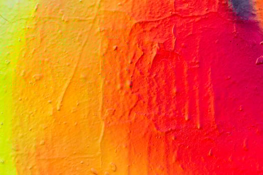 Fragment of colored graffiti painted on a wall. photo