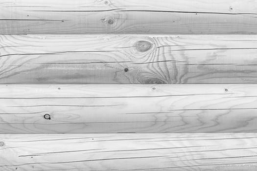 Wooden wall from logs as a background photo