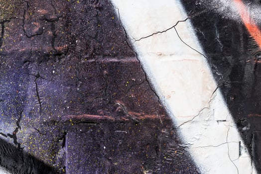 Graffiti painted on a brick wall texture. photo