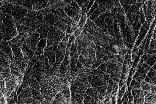 Black natural leather texture. Abstract background for design. photo