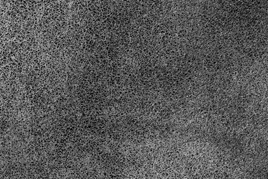 Black natural leather texture. Abstract background for design. photo