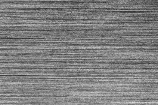 Silver metal texture with white scratches. Abstract noise black background overlay for design. photo