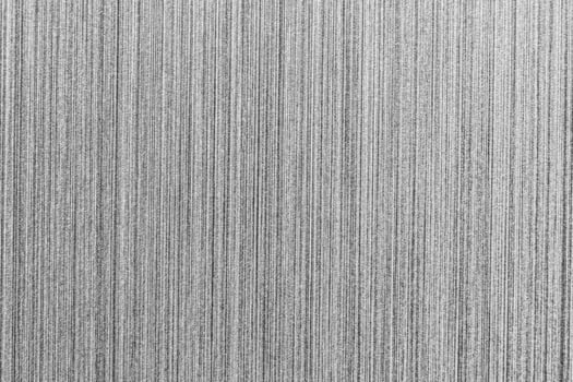 Silver metal texture with white scratches. Abstract noise black background overlay for design. photo