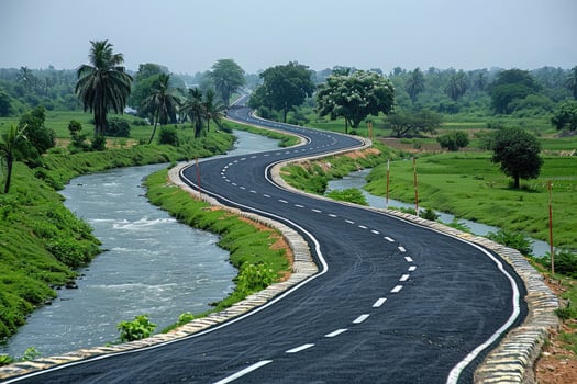 the river along with a road going through the border of the road professional photography photo