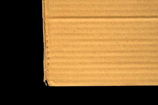 Cardboard Pieces Textured Background. Carton Piece, Ripped Kraft Paper Wallpaper, Brown Wrapping Vintage Paper Isolated Top View photo