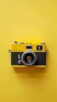 Yellow background to evoke vintage retro vibes, retro props such as vinyl records, old cameras, and vintage signage photo