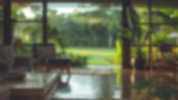 blurred living room with greenery view photo