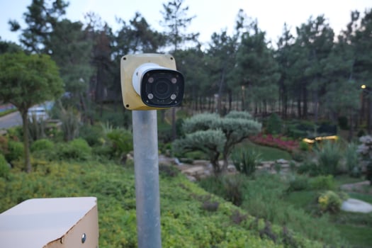 CCTV security camera operating outdoor photo