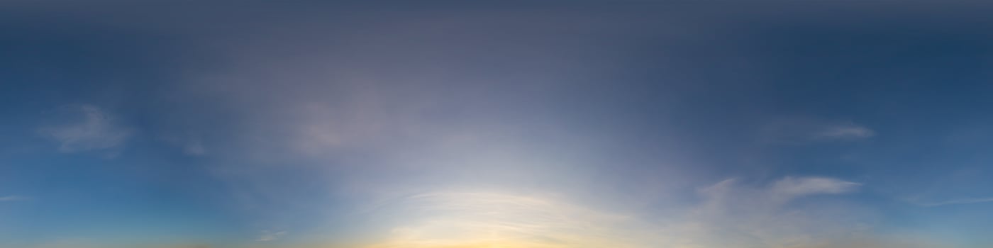 Dark blue sunset sky panorama with Cirrus clouds. Seamless hdr pano in spherical equirectangular format. Complete zenith for 3D visualization, game and sky replacement for aerial drone 360 panoramas. photo