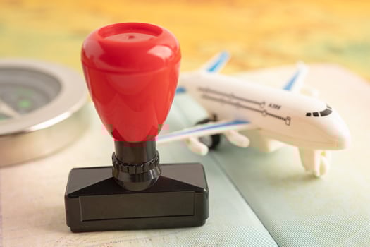 Approved Stamp visa and passport document to immigration at airport in country. photo