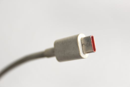 Mobile phone USB charging cable type-c isolated on white background photo