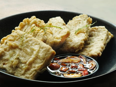 Traditional Indonesian snack, tempe mendoan made from soybeans with savory taste. photo