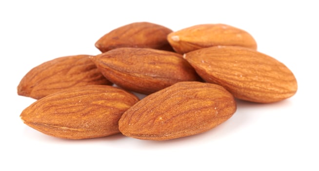 almond nut on white photo