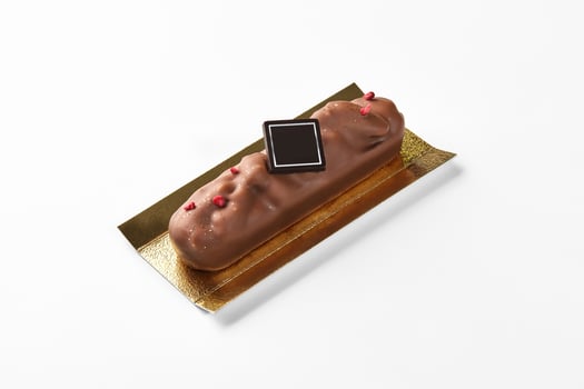 Milk chocolate bar with pecan and dried berry crumbs photo