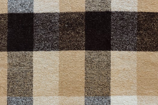 Brown Checkered Wool Plaid Fabric Texture Background photo