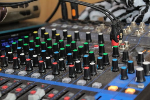sound studio mixing desk stock photo, Audio music mixer console on a black background photo