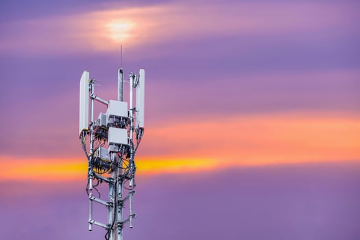 Antenna and Transceiver 5G, 4G on sunset background. photo