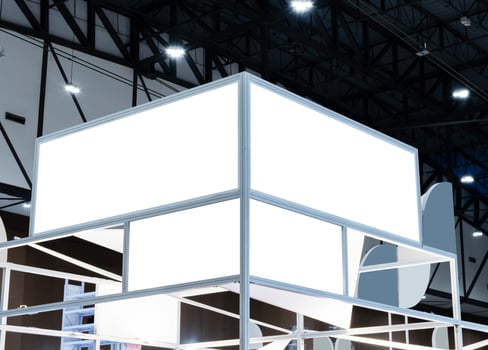 Mock up white horizontal billboard on exhibition booth. clipping path for mock up photo
