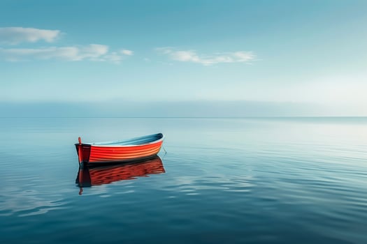 Lone boat on a calm, empty sea. Copy space. photo