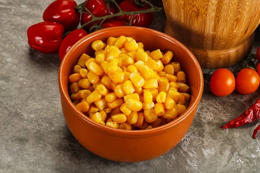Sweet canned ripe corn grain photo