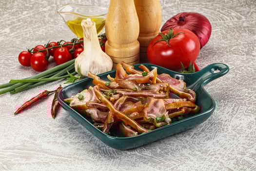 Sliced smoked pork ear snack photo