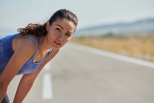 Close-Up Portrait of Determined Athlete Resting After Intense Workout photo