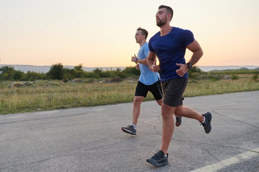 Marathon Partners. Two Athletic Friends Training Together for Upcoming Competition. photo