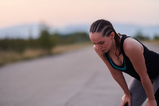 Close-Up Portrait of Determined Athlete Resting After Intense Workout photo