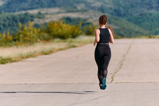 Unstoppable. A Determined Athlete Trains Through the Rain in Pursuit of Marathon Glory photo